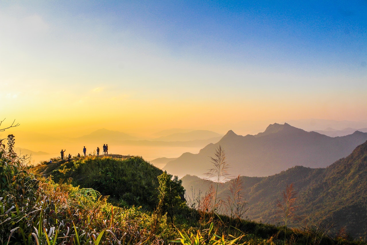 Services 3 photo of people standing on top of mountain near grasses 733162